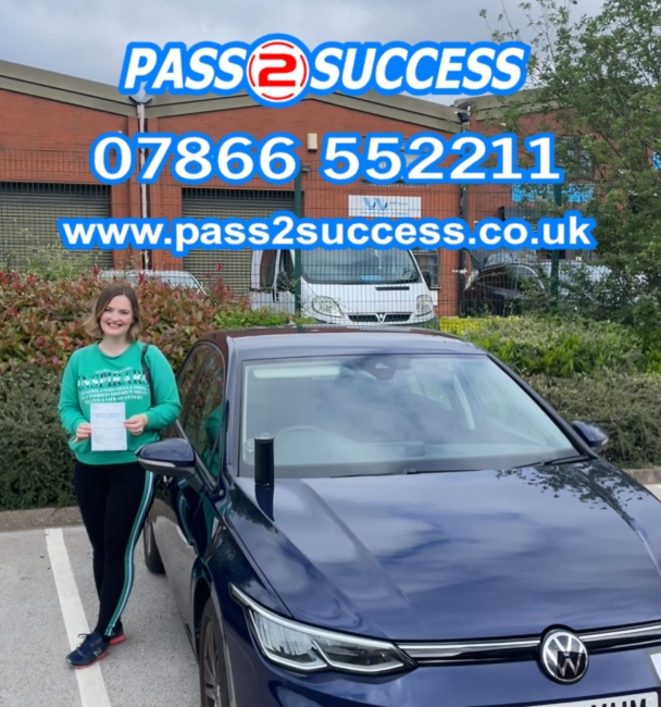 Jennifer celebrating her first-time driving test pass at Garretts Green