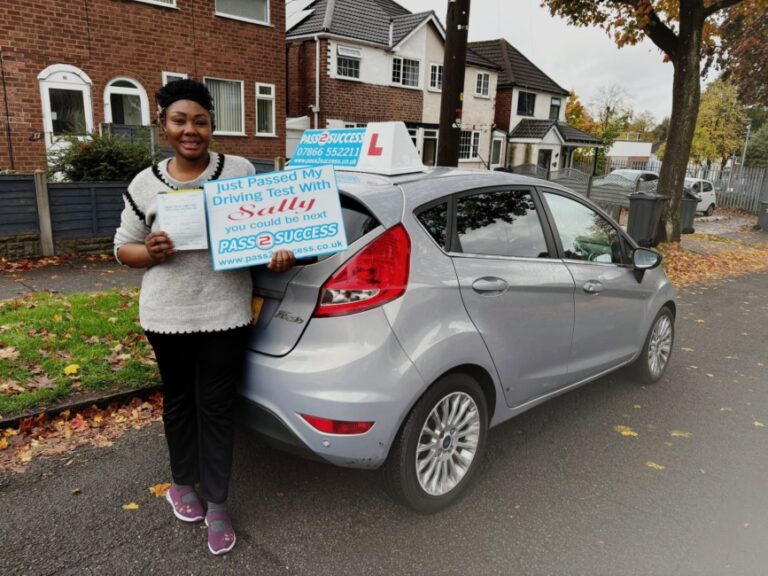 Uzoamaka celebrating first-time driving test pass at Kingstanding Birmingham