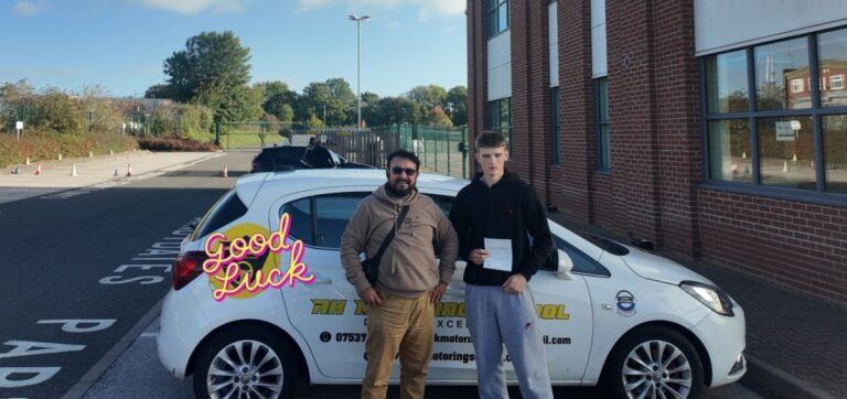 Pass2Success driving instructor congratulating Will Spear after his successful manual test.