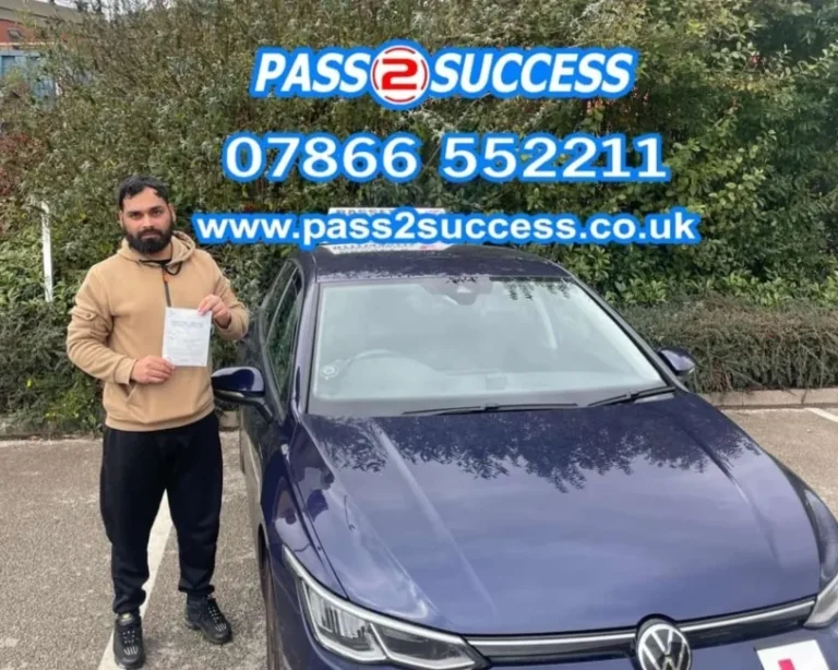 Muhammad Hafeez celebrating first-time driving test success in Garretts Green with Pass2Success Driving School”