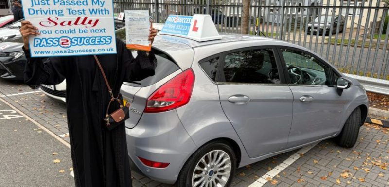 Nadia celebrating her automatic driving test pass