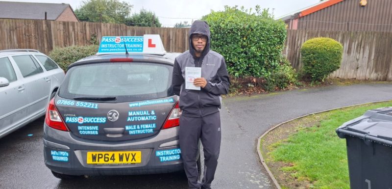 Reece celebrating his manual driving test pass