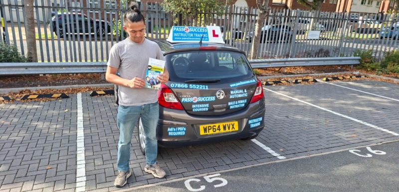 Sahil celebrating his manual driving test pass