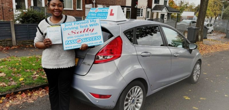 Uzoamaka celebrating her automatic driving test pass